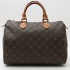 Louis Vuitton Speedy 30 handbag in brown monogram canvas and natural leather - Detail D7 thumbnail