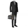 Bolsa de viaje Louis Vuitton Feuillage en lona Monogram Eclipse negra y cuero negro - Detail D1 thumbnail