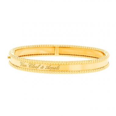 Bracciale a cerchio Van Cleef & Arpels Perlée Signature in oro giallo