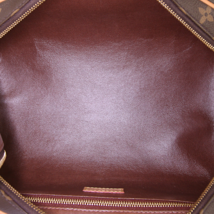 Pochette Louis Vuitton Toiletry en toile monogram et cuir naturel - Detail D2