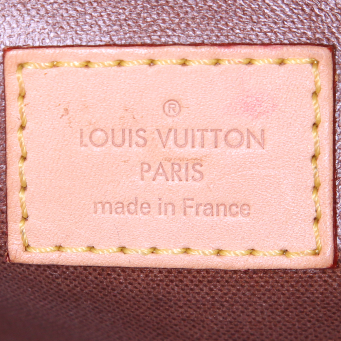 Pochette Louis Vuitton Toiletry en toile monogram et cuir naturel - Detail D3