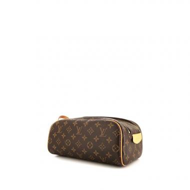 Pochette Louis Vuitton Toiletry in tela monogram e pelle naturale
