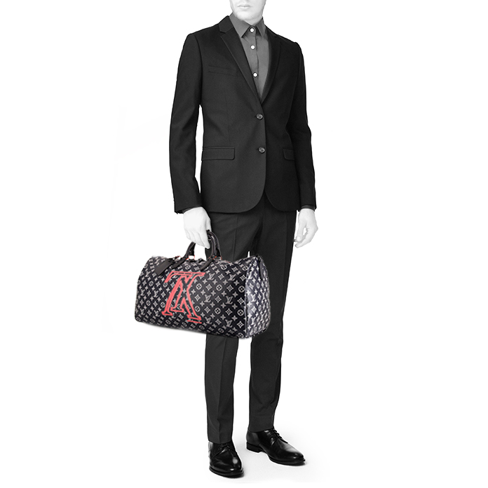 Louis Vuitton Keepall Upside Down Editions Limitées travel bag in blue, white and red monogram canvas and blue leather - Detail D1