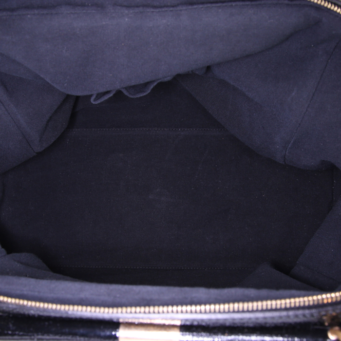 Bolso de mano Saint Laurent en charol negro - Detail D2