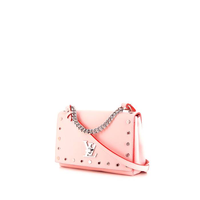 Borsa a tracolla Louis Vuitton Capucines in pelle martellata rosa polvere  con decorazione di nastri