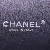 Chanel Timeless Maxi Jumbo handbag in black chevron quilted leather - Detail D4 thumbnail