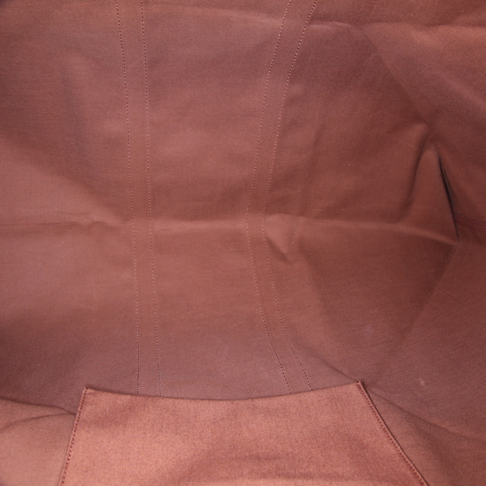 Bolsa de viaje Louis Vuitton Polochon en lona estampada con diseños roja y cuero natural - Detail D2