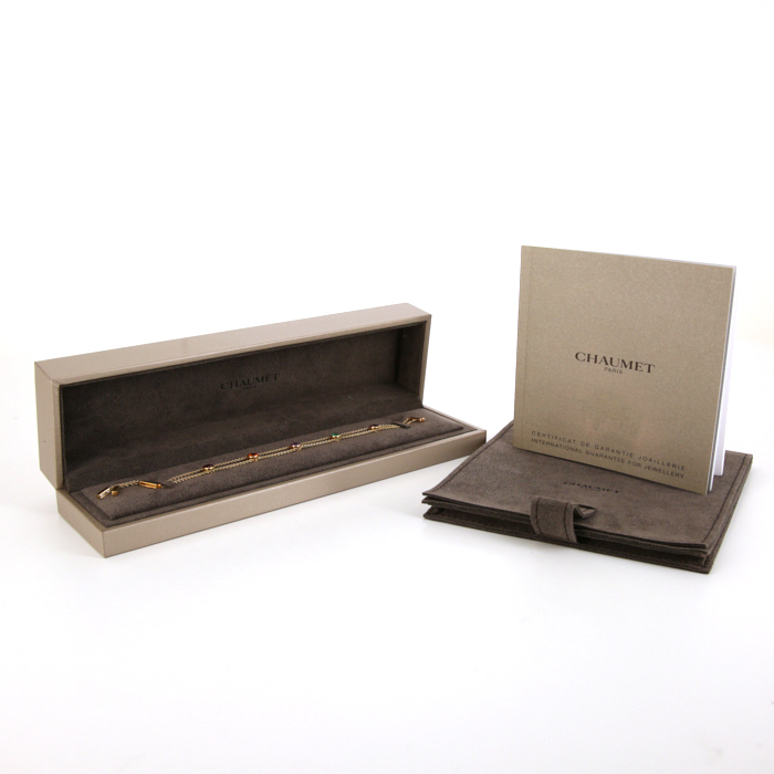 Brazalete en oro amarillo,  piedras semipreciosas y diamantes