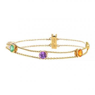 Brazalete en oro amarillo,  piedras semipreciosas y diamantes