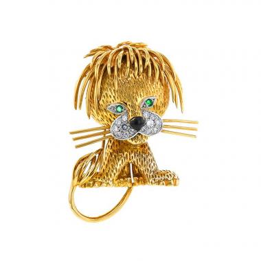 Broche-colgante época años 70 Van Cleef 
Arpels Lion Ebouriffé en oro amarillo,  platino y diamantes y en esmeralda