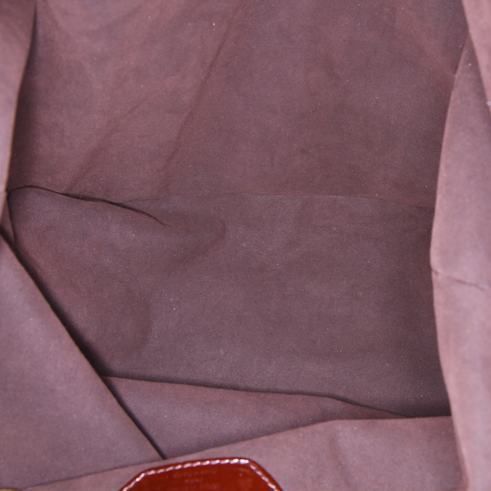 Louis Vuitton Surya handbag in brown patent leather - Detail D2