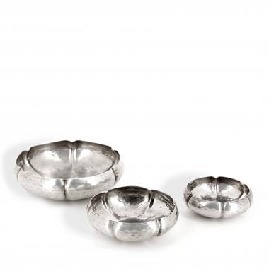 Christian Dior, three small silver plated and hammered metal trinkets, signed, 1970s