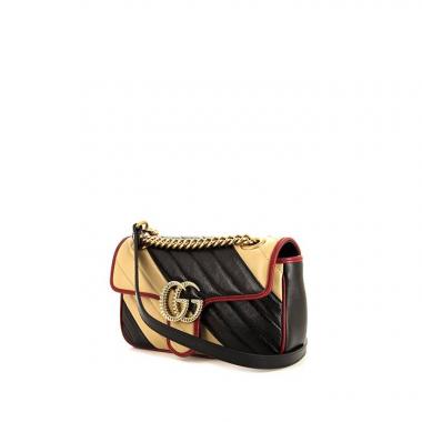 Bolso bandolera Gucci GG Marmont mini en cuero acolchado negro y beige y junco rojo