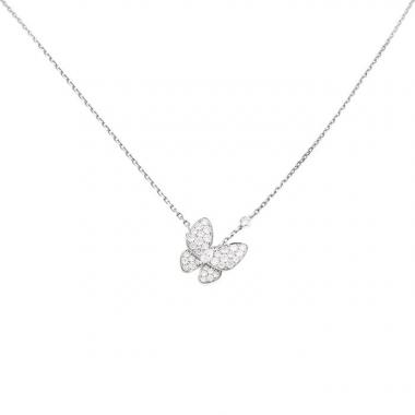Van Cleef 
Arpels Deux Papillons necklace in white gold and diamonds