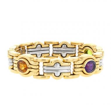 Bulgari Parentesi 1980's bracelet in yellow gold,  stainless steel and colored stones