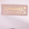 Chanel shopping bag in beige and white bicolor logo canvas and beige leather - Detail D3 thumbnail