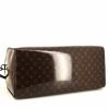 Louis Vuitton Keepall Editions Limitées weekend bag in brown monogram canvas and black leather - Detail D5 thumbnail