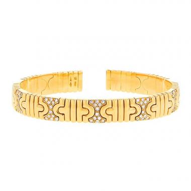 Brazalete época años 80 semiarticulado Bulgari Parentesi en oro amarillo y diamantes Brazalete época años 80 semiarticulado Bulgari Parentesi en oro amarillo y diamantes