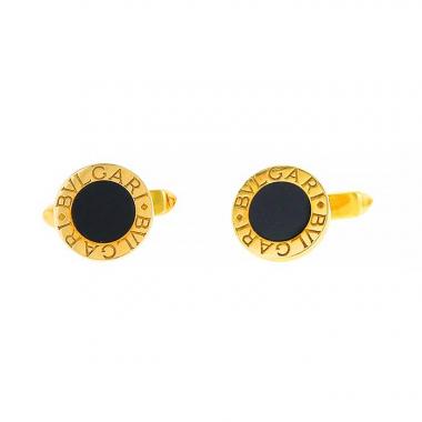 Paire de boutons de manchette époque années 80 Bulgari en or jaune et onyx Paire de boutons de manchette époque années 80 Bulgari en or jaune et onyx