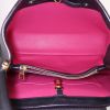 Louis Vuitton Capucines medium model handbag in black grained leather - Detail D2 thumbnail