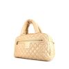 Bolso de mano Chanel Coco Cocoon en cuero acolchado dorado - 00pp thumbnail