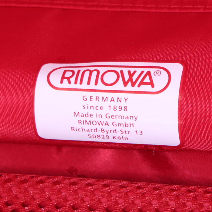Rimowa Check-In Edition Limitée rigid suitcase in red and white bicolor aluminium and red plastic - Detail D4