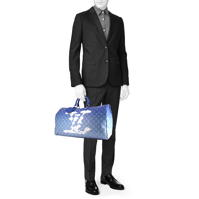 Louis Vuitton Keepall Editions Limitées weekend bag in light blue and white Clouds monogram canvas and blue leather - Detail D1