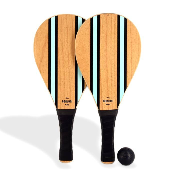 Berluti, a set of beach rackets, summer 2019 capsule collection, in wood and leather Venezia with its original cover and leather ball - 00pp