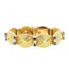 Bracelet époque années 60 semi-articulé ouvrant Boucheron en or jaune,  diamants et saphirs - 00pp thumbnail