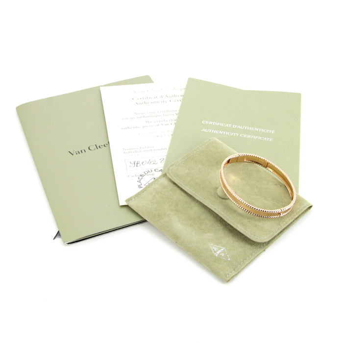 Brazalete redondo Van Cleef 
Arpels Perlée Signature en oro rosa