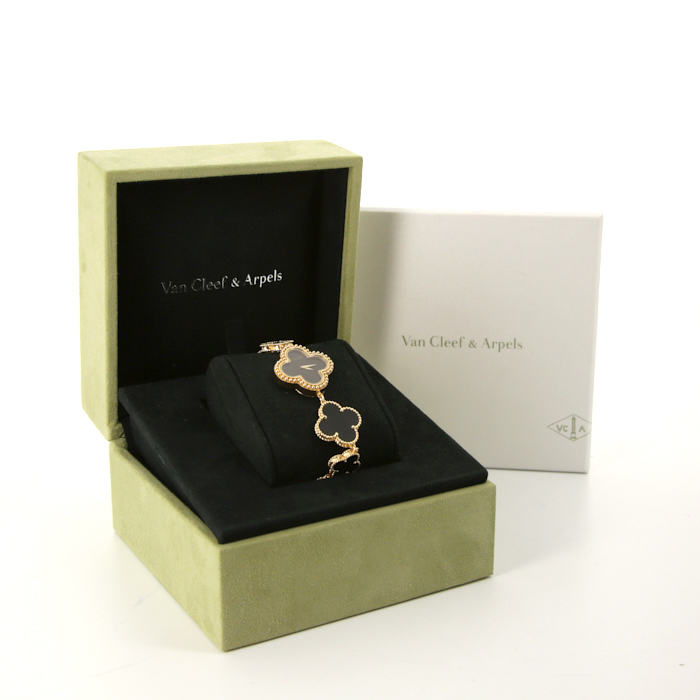 Van Cleef & Arpels Alhambra watch in yellow gold and onyx