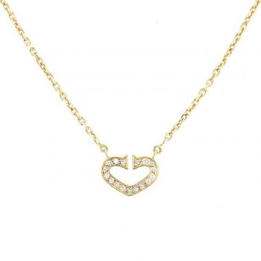 Collier ouvert C de Cartier petit modèle en or jaune et diamants