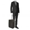 Louis Vuitton Pegase soft suitcase in black taiga leather - Detail D1 thumbnail