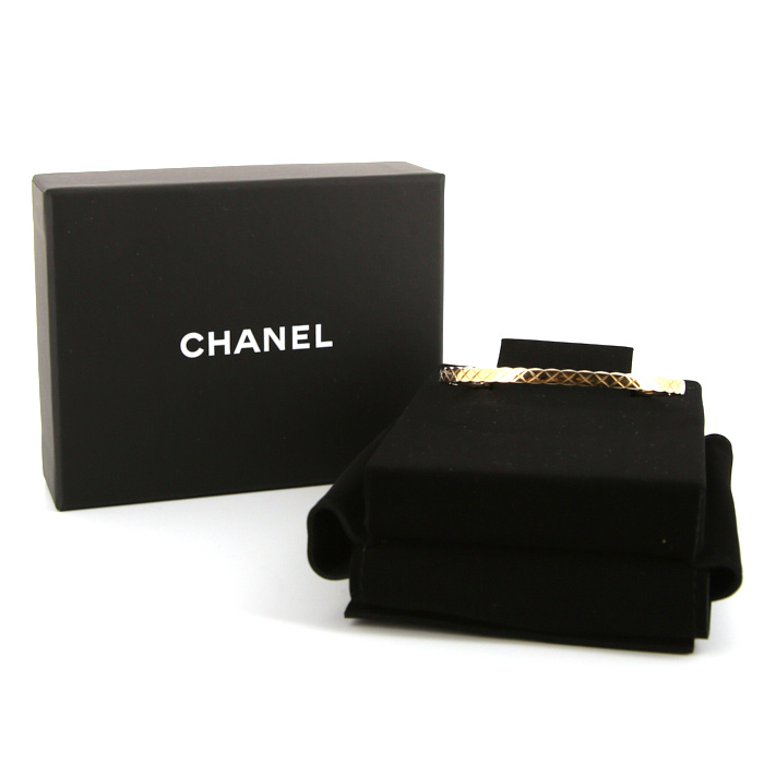 Bracelet jonc Chanel Coco taille M en or jaune