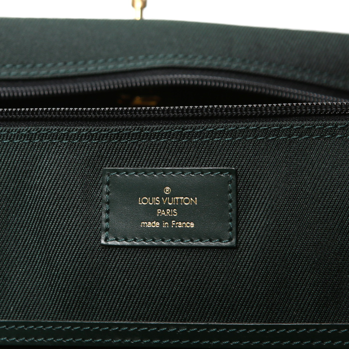 Funda protectora para ropa Louis Vuitton Porte-habits en cuero taiga verde pino y lona verde - Detail D5