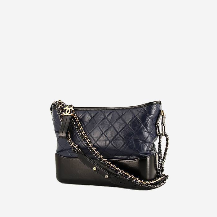 Sac bandoulière Chanel  Gabrielle  moyen modèle  en cuir matelassé bleu et cuir lisse noir