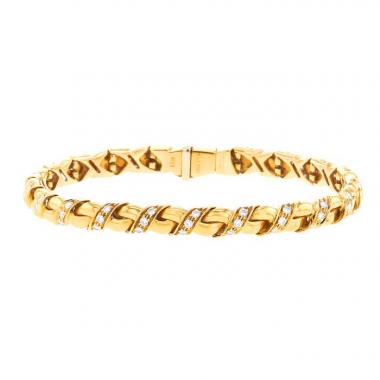 Brazalete flexible Chaumet Torsade en oro amarillo y diamantes