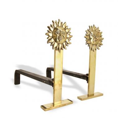 Pair of  "Sun" firedogs in golden and cast metal, from the 1980's