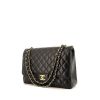 Chanel Timeless Maxi Jumbo handbag in black quilted grained leather - 00pp thumbnail