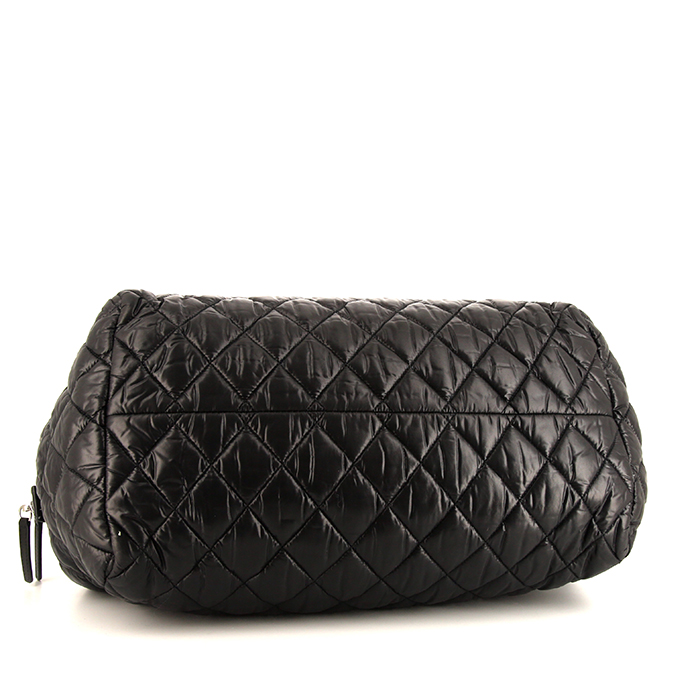 Chanel Coco Cocoon bag worn on the shoulder or carried in the hand in black quilted canvas and black leather - Detail D4