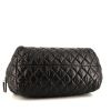 Chanel Coco Cocoon bag worn on the shoulder or carried in the hand in black quilted canvas and black leather - Detail D4 thumbnail