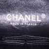 Chanel Timeless Classic handbag in black quilted grained leather - Detail D4 thumbnail