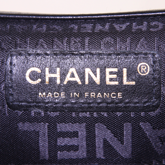 Chanel Baguette handbag/clutch in black leather - Detail D4
