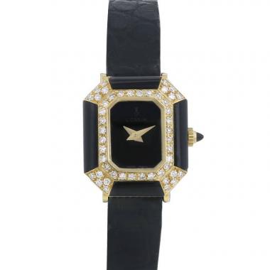 Reloj Corum de oro amarillo y ónix Circa  1960