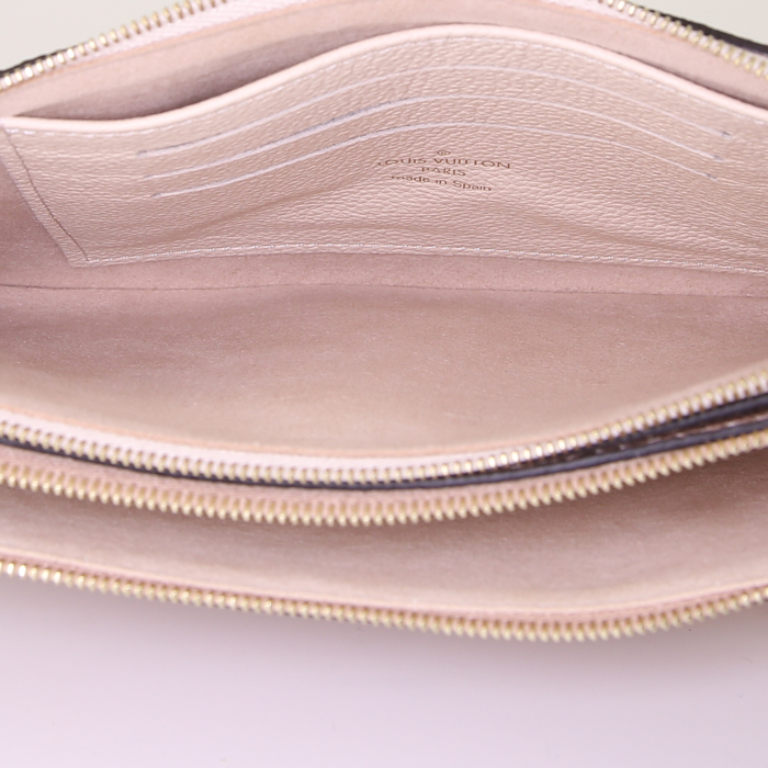 Louis Vuitton Double Zip pouch in beige and cream color empreinte monogram leather - Detail D3