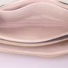 Louis Vuitton Double Zip pouch in beige and cream color empreinte monogram leather - Detail D3 thumbnail