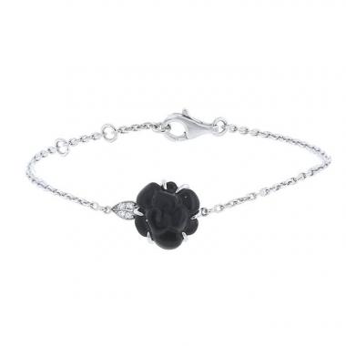 Bracelet Chanel Camelia en onyx,  or blanc et diamants