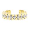 Hald-rigid open Mauboussin Arlequin 1980's bangle in yellow gold and stainless steel - 00pp thumbnail