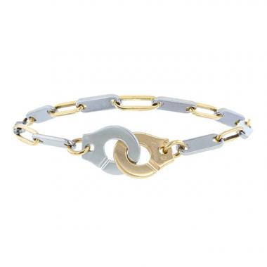 Brazalete Dinh Van Menottes R12 en oro amarillo y acero