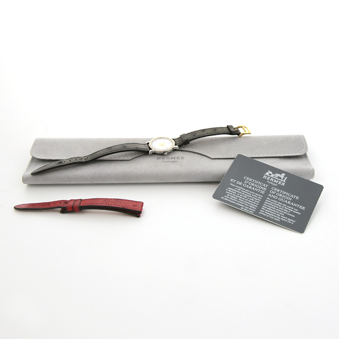 Montre Hermes Sellier - wristwatch en acier et plaqué or Vers  1987
